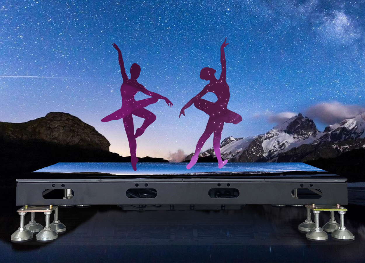 Outdoor Floor LED Screen 6 - LED Screen Board - LED Screen Board Two purple silhouette dancers on a reflective stage against a starry night sky and mountains.