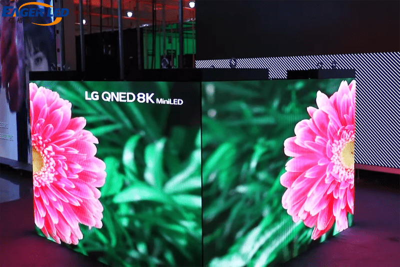 Flower video content shown on adjacent faces of an EagerLED cube demonstration