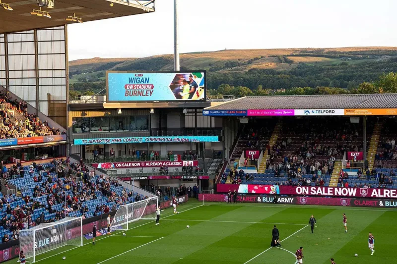 Pitch-side stadium LED perimeter display installed along a football field