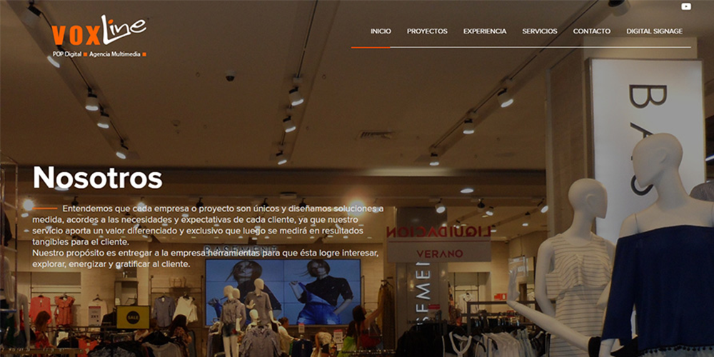 Voxline hero: store interior with mannequins and clothing racks; large 'Nosotros' title and descriptive paragraph.