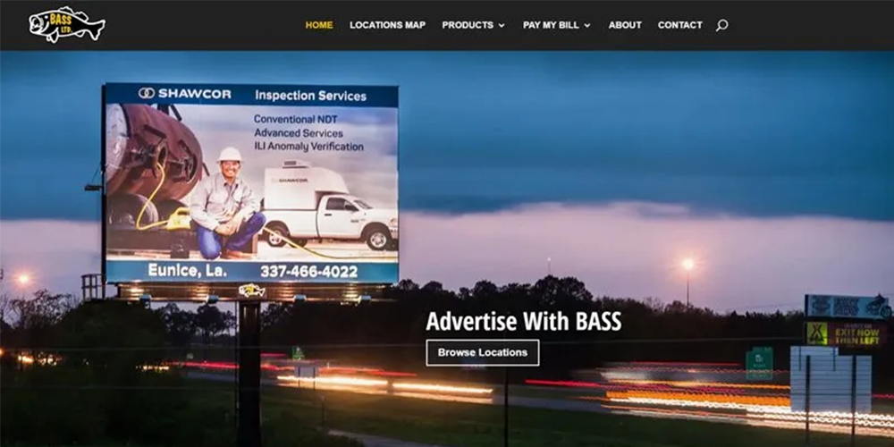 Sunset highway billboard advertising with overlay text 'Advertise With BASS' and a 'Browse Locations' button, car light trails nearby