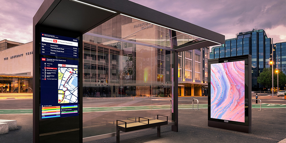 Weather-resistant digital displays at a public transit shelter