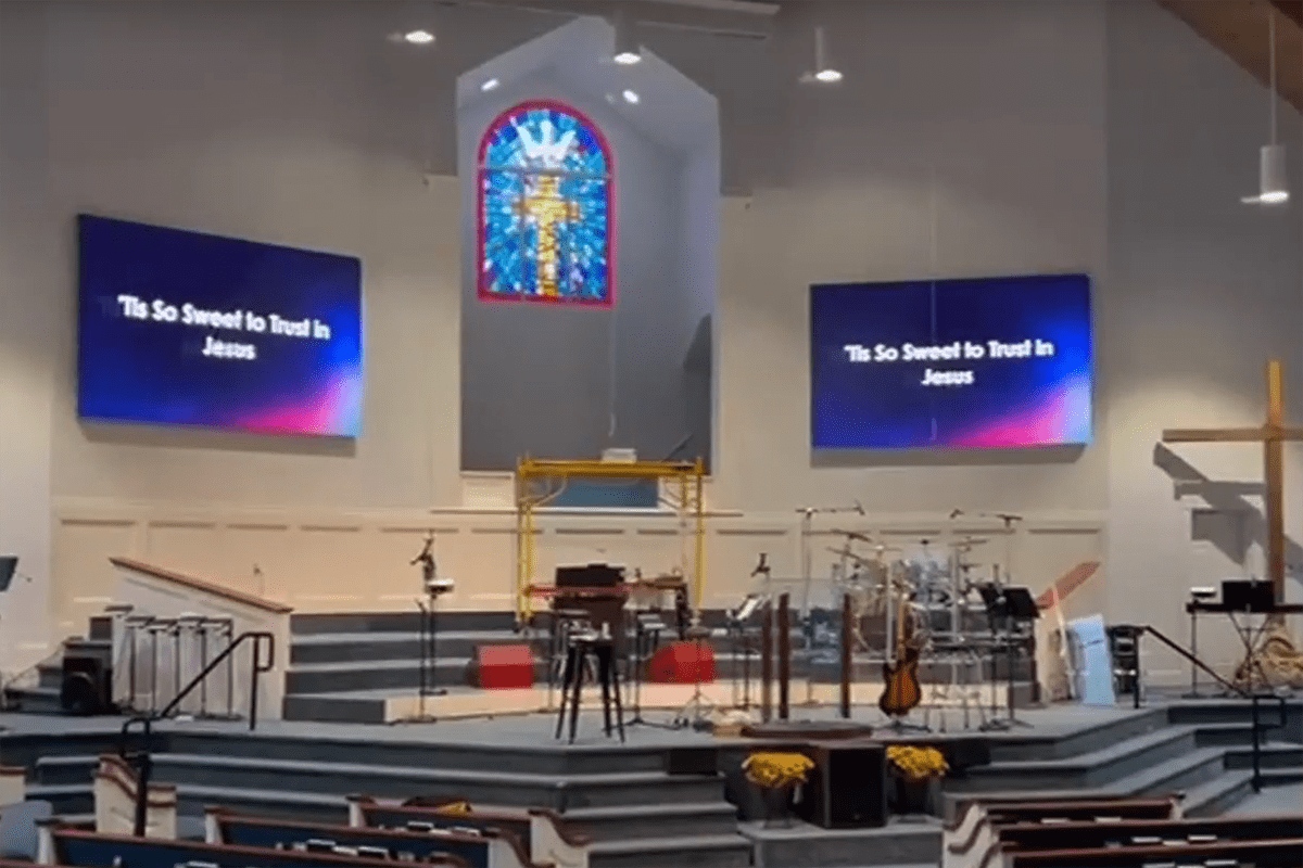 Church LED screen quotation worksheet - LED Screen Board - LED Screen Board Two LED video walls displaying worship lyrics in a church sanctuary