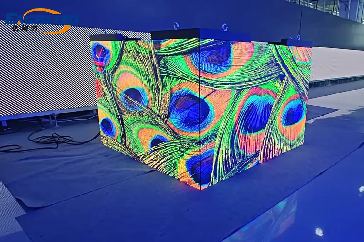 Cube LED display demonstration - LED Screen Board - LED Screen Board EagerLED cube-shaped LED display demonstration with peacock graphics visible on adjacent faces