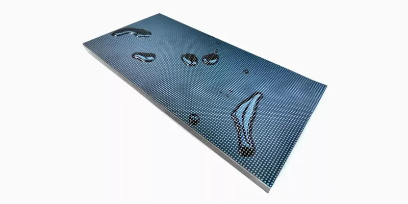 Water droplets resting on the encapsulated face of a rectangular GOB LED module
